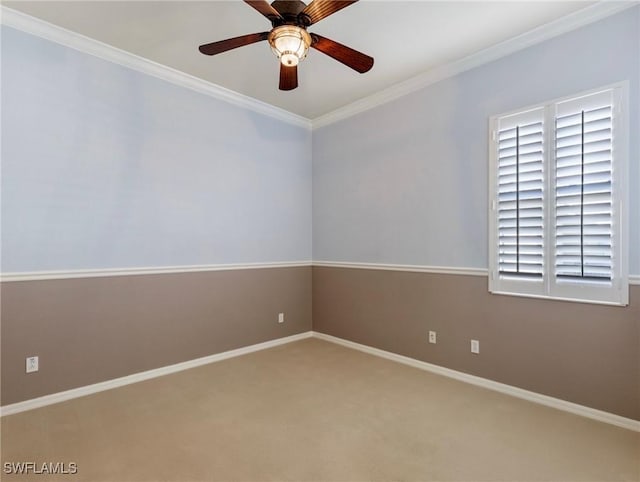 unfurnished room featuring ceiling fan, a wealth of natural light, carpet floors, and crown molding