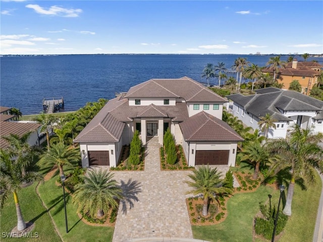 birds eye view of property featuring a water view