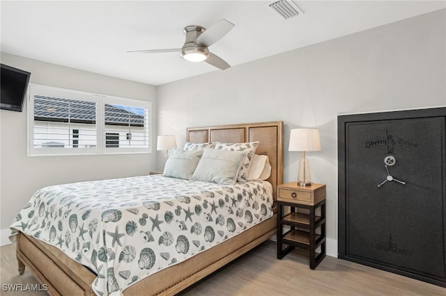 bedroom featuring ceiling fan and light wood-type flooring