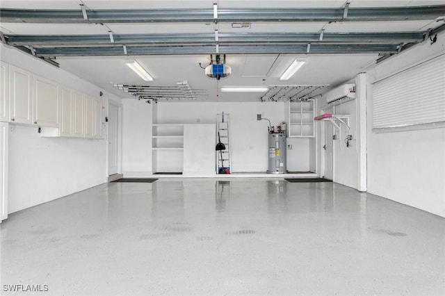 garage with a garage door opener, electric water heater, and a wall mounted AC