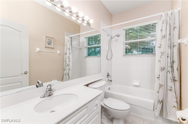 full bathroom featuring vanity, toilet, and shower / bath combo with shower curtain