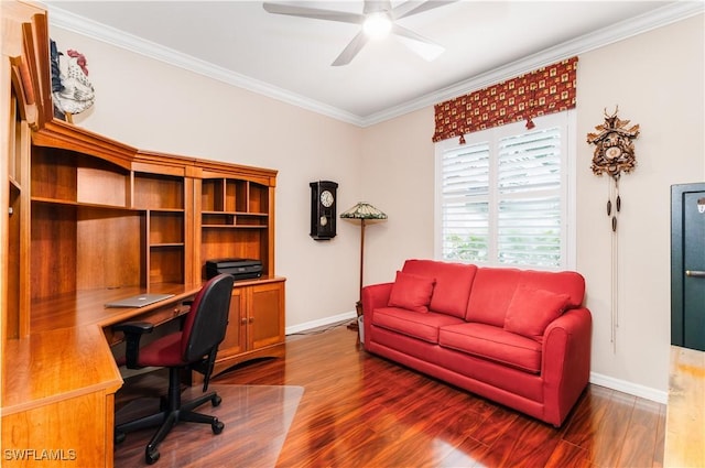 home office featuring dark wood-type flooring, ceiling fan, and crown molding