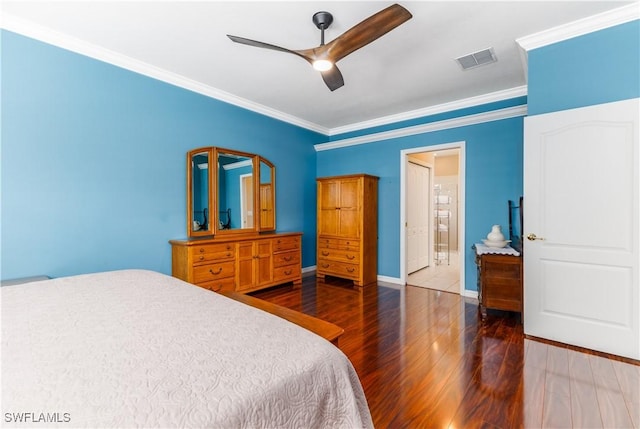 bedroom featuring ceiling fan, crown molding, and dark hardwood / wood-style floors