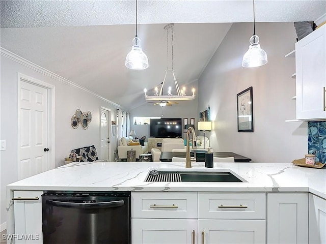 kitchen with sink, pendant lighting, dishwasher, white cabinetry, and lofted ceiling