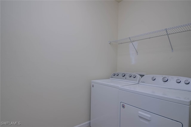 laundry area with washer and dryer