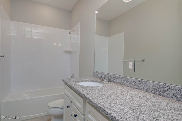 full bathroom featuring shower / washtub combination, vanity, and toilet