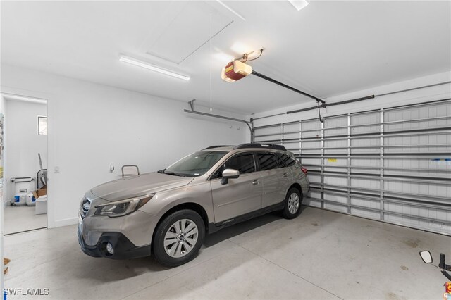 garage featuring a garage door opener