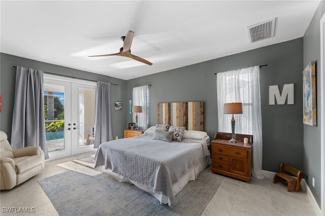 tiled bedroom featuring ceiling fan, access to outside, and french doors