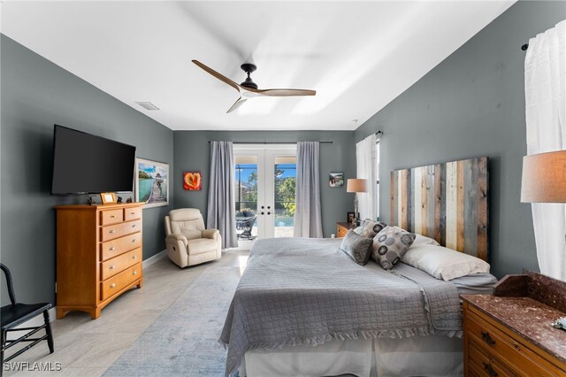 bedroom with access to outside, ceiling fan, french doors, and light tile patterned floors