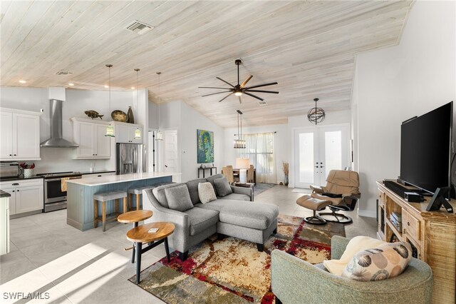 living room with french doors, wood ceiling, ceiling fan, lofted ceiling, and light tile patterned flooring