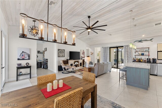 dining area featuring french doors, wood ceiling, ceiling fan with notable chandelier, indoor bar, and a high ceiling