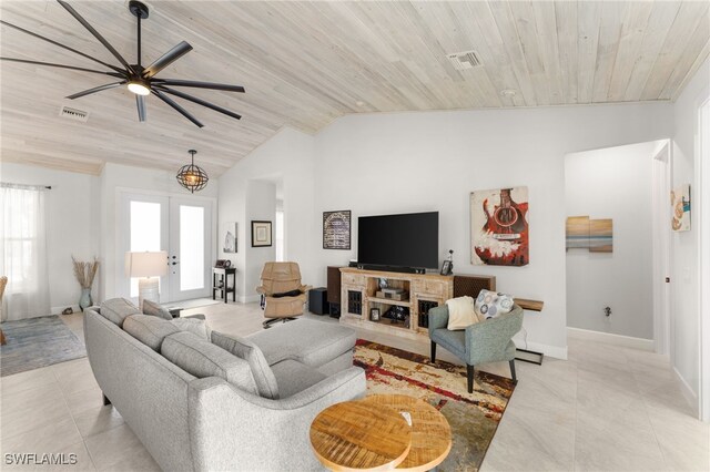 tiled living room with french doors, lofted ceiling, ceiling fan, and wooden ceiling