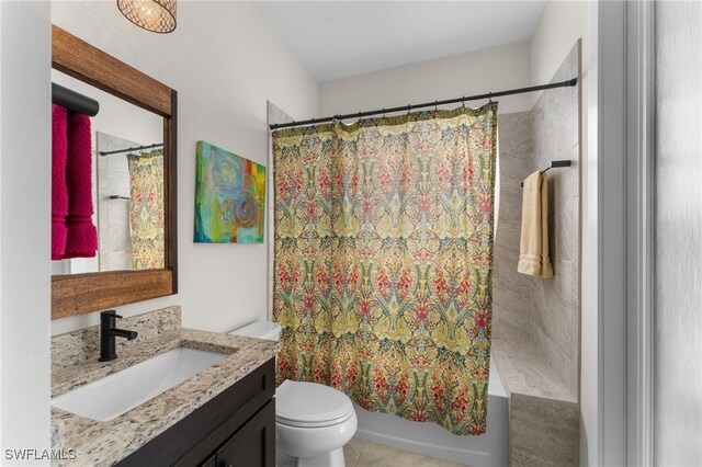 full bathroom with vanity, toilet, and shower / tub combo with curtain