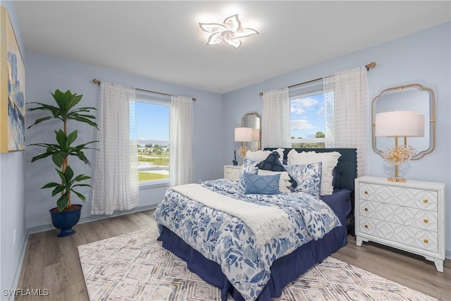 bedroom featuring hardwood / wood-style floors