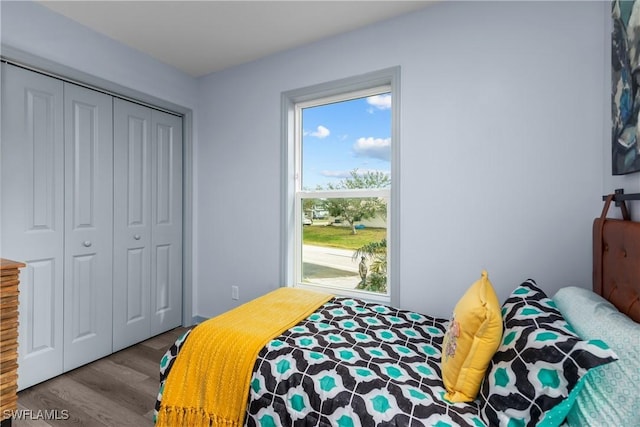 bedroom with a closet and light wood-type flooring