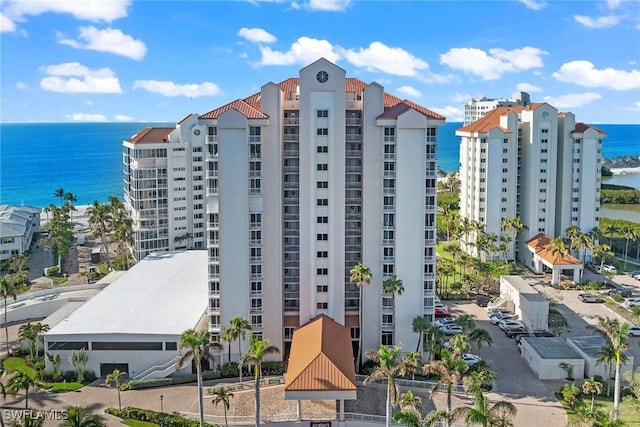 view of building exterior with a water view