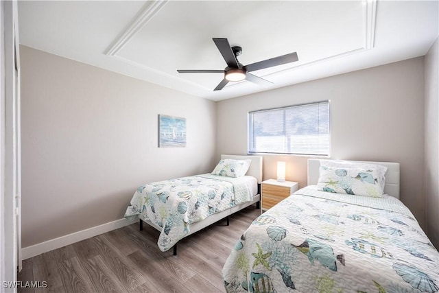 bedroom featuring ceiling fan and wood-type flooring