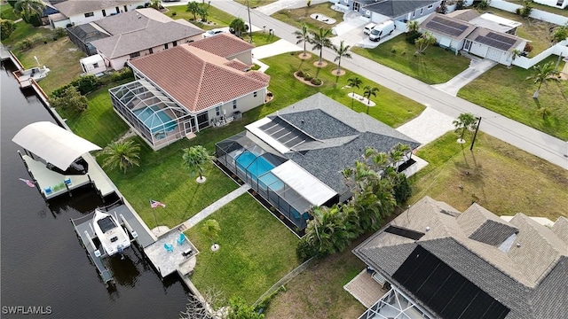 drone / aerial view featuring a water view