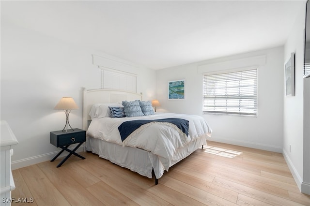 bedroom featuring light wood-type flooring