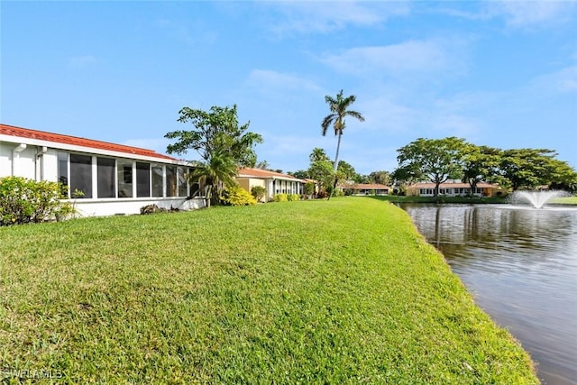 view of yard featuring a water view