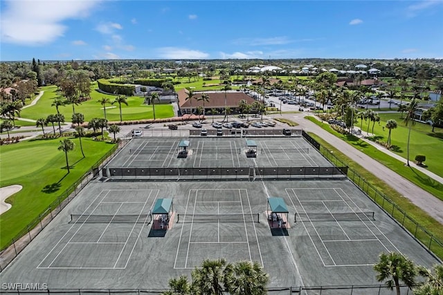 birds eye view of property with golf course view