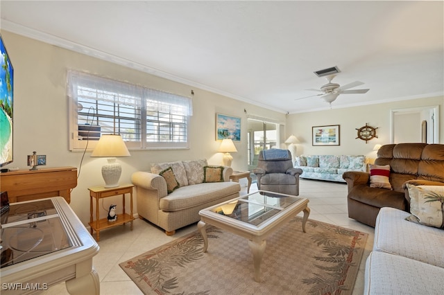 living room featuring ceiling fan, light tile patterned flooring, and crown molding