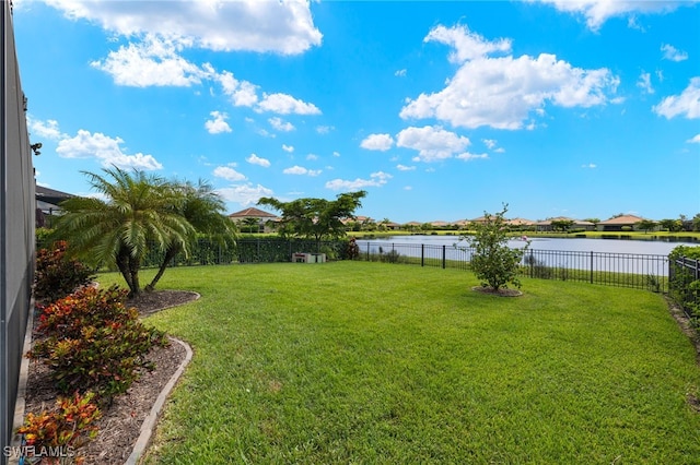 view of yard with a water view