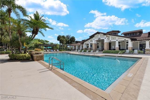 view of swimming pool featuring a patio