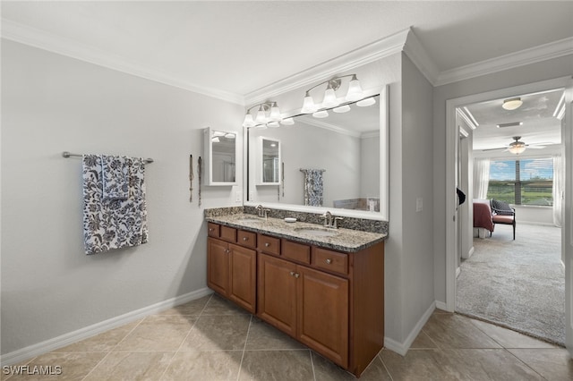 bathroom with tile patterned flooring, vanity, ceiling fan, and ornamental molding