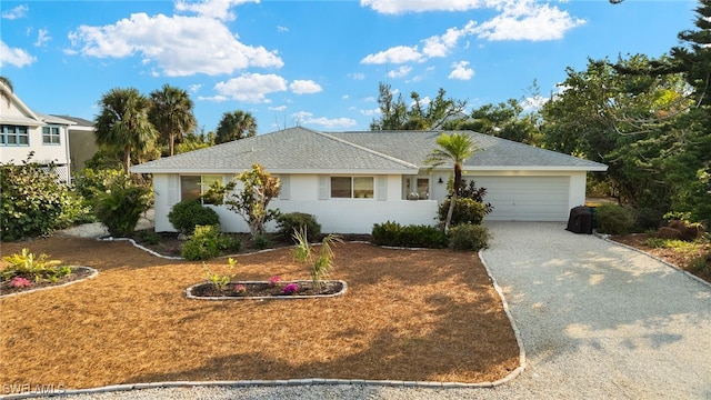 single story home with a garage