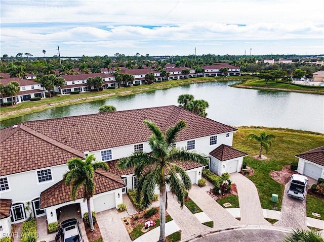 drone / aerial view with a water view