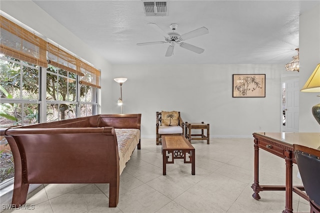 living room with ceiling fan