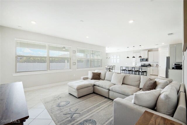 tiled living room with sink