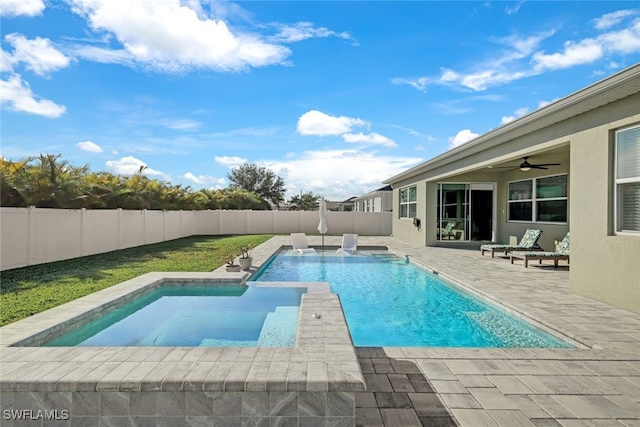 view of pool with ceiling fan and a patio