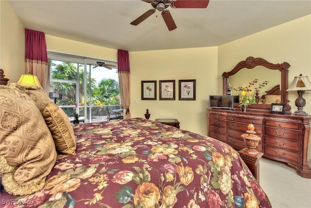 carpeted bedroom featuring access to outside and ceiling fan