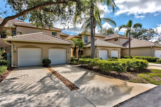 view of front of property with a garage