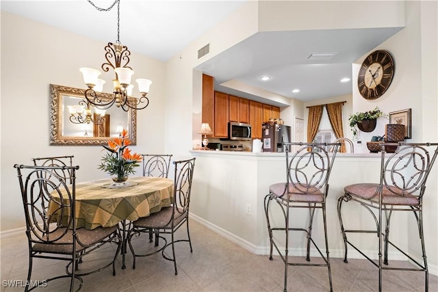 dining room featuring recessed lighting, visible vents, baseboards, and light tile patterned floors