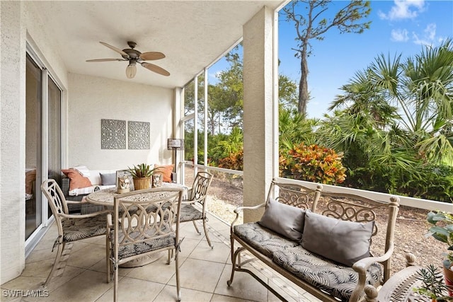 sunroom / solarium with ceiling fan