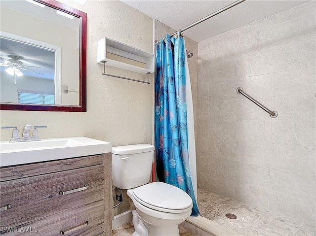 bathroom with ceiling fan, vanity, curtained shower, and toilet