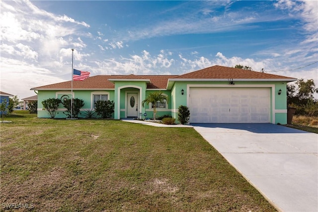 ranch-style house featuring a garage and a front lawn