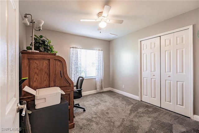 carpeted home office with ceiling fan