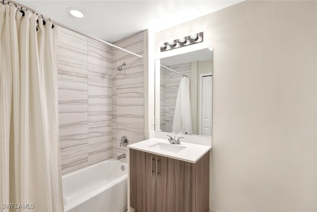 bathroom with vanity and shower / bath combo with shower curtain