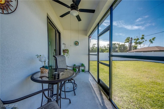 sunroom / solarium with ceiling fan