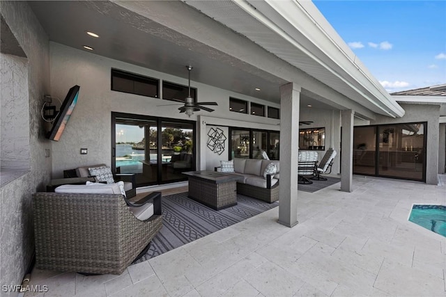 view of patio featuring outdoor lounge area and ceiling fan