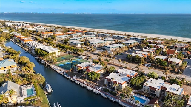 bird's eye view featuring a beach view and a water view