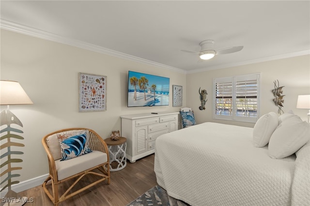 bedroom with ceiling fan, dark hardwood / wood-style flooring, and crown molding