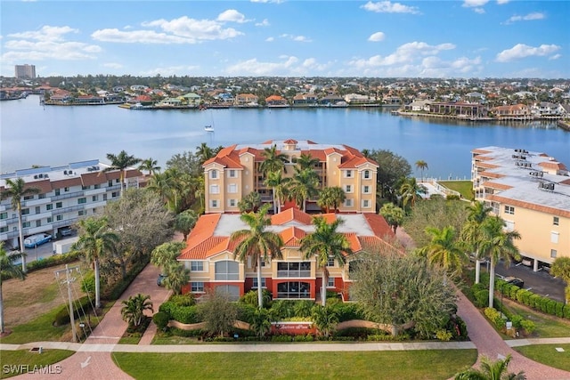 drone / aerial view with a water view