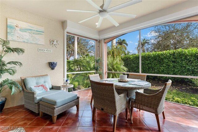 sunroom / solarium with ceiling fan