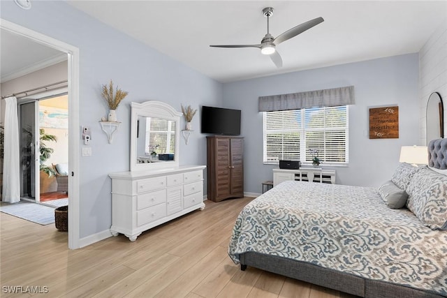 bedroom featuring multiple windows, light wood-type flooring, access to outside, and ceiling fan