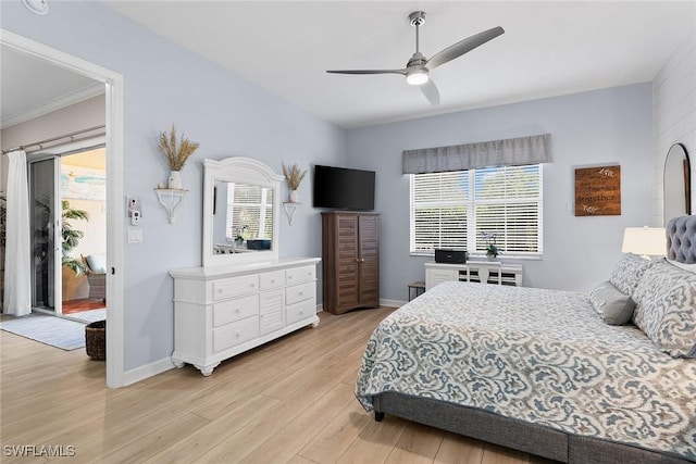 790 W Elkcam Cir Unit 103, Marco Island, FL 34145 - bedroom with baseboards, ceiling fan, and light wood-style floors